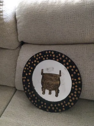 Espejo decorativo con diseño de vasija