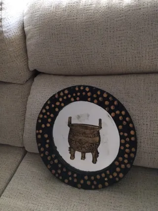 Espejo decorativo con diseño de vasija