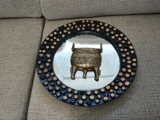 Espejo decorativo con diseño de vasija