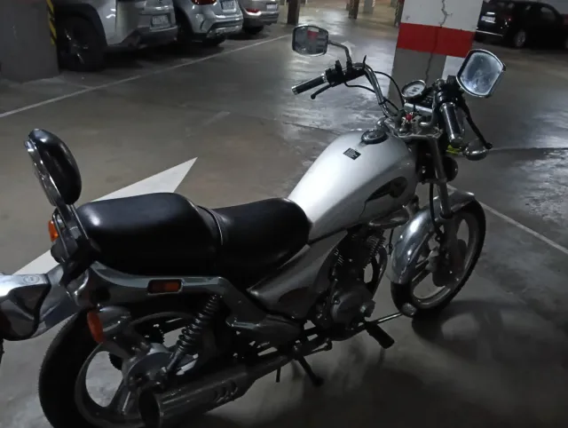 Daelim 125 VS Evolution.