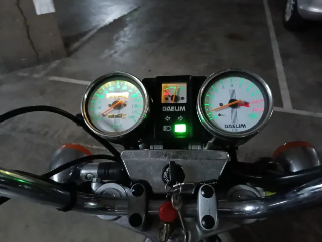 Daelim 125 VS Evolution.