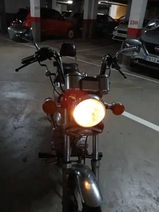 Daelim 125 VS Evolution.