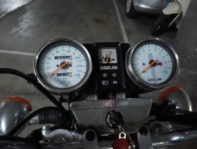 Daelim 125 VS Evolution.