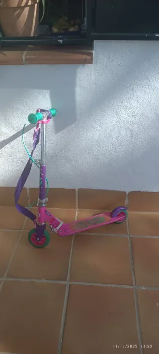 Patinete Oxelo rosa y morado