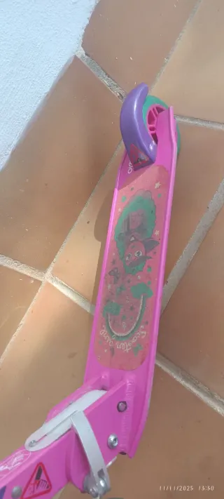Patinete Oxelo rosa y morado