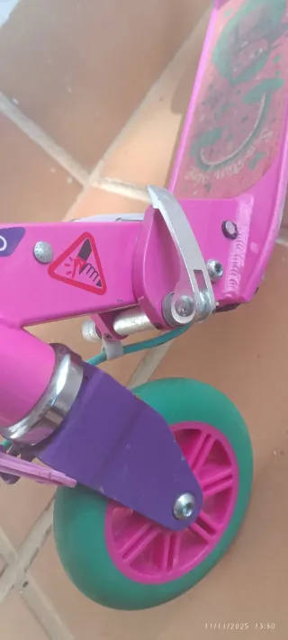 Patinete Oxelo rosa y morado