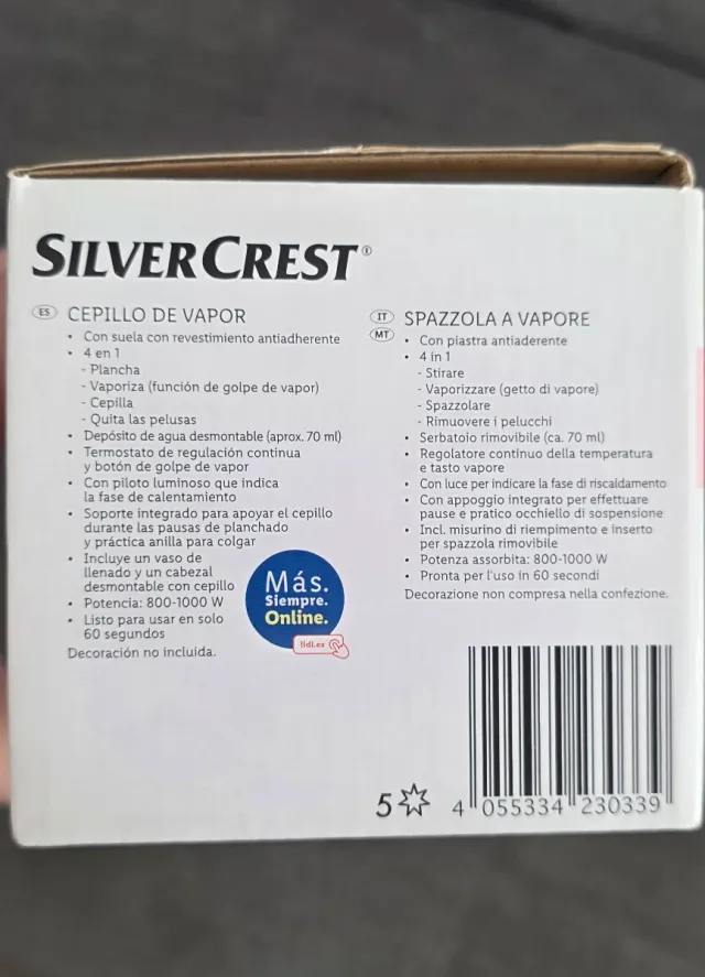 Plancha de vapor vertical rosa y blanca