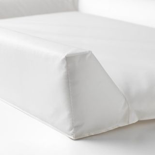 Cambiador y funda protectora sin usar