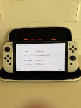 Nintendo Switch OLED Plata con funda