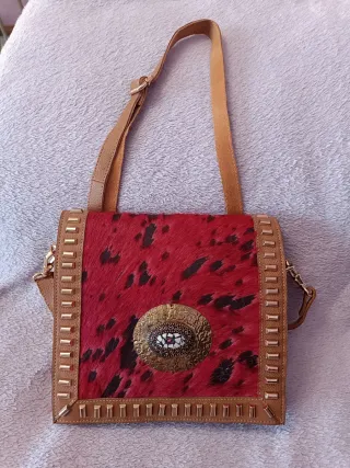 Bolso piel y pelo efecto vaca