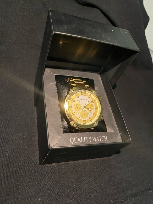 Reloj SKYLINE Dorado Nuevo