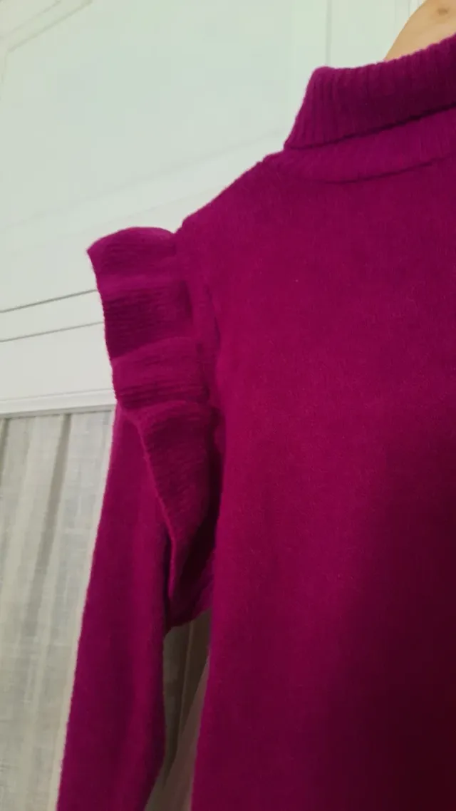 Chaleco rosa  T.M volante en hombro. Rosa favorece