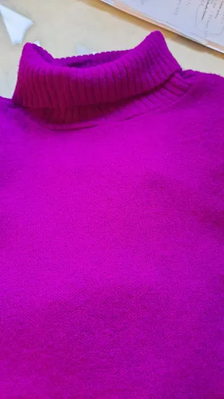 Chaleco rosa  T.M volante en hombro. Rosa favorece