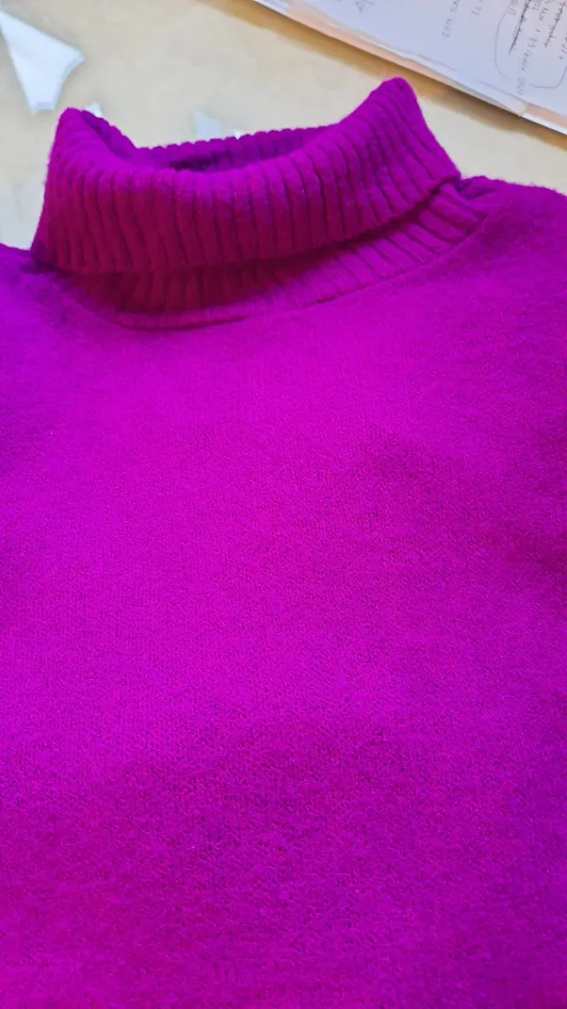 Chaleco rosa  T.M volante en hombro. Rosa favorece