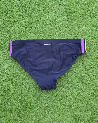 Bañador Adidas slip azul marino y rayas de colores