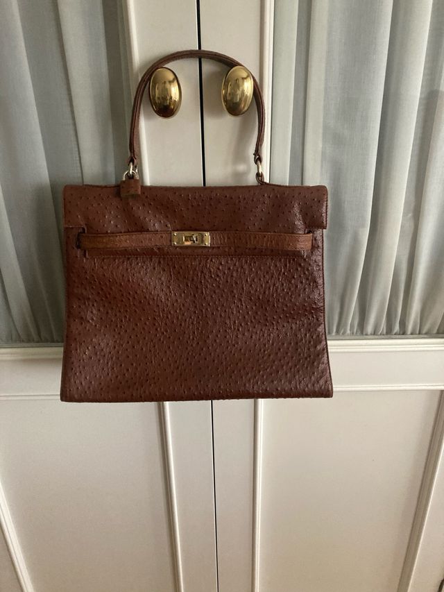 Bolso de piel marrón impecable