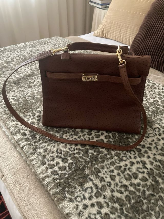 Bolso de piel marrón impecable