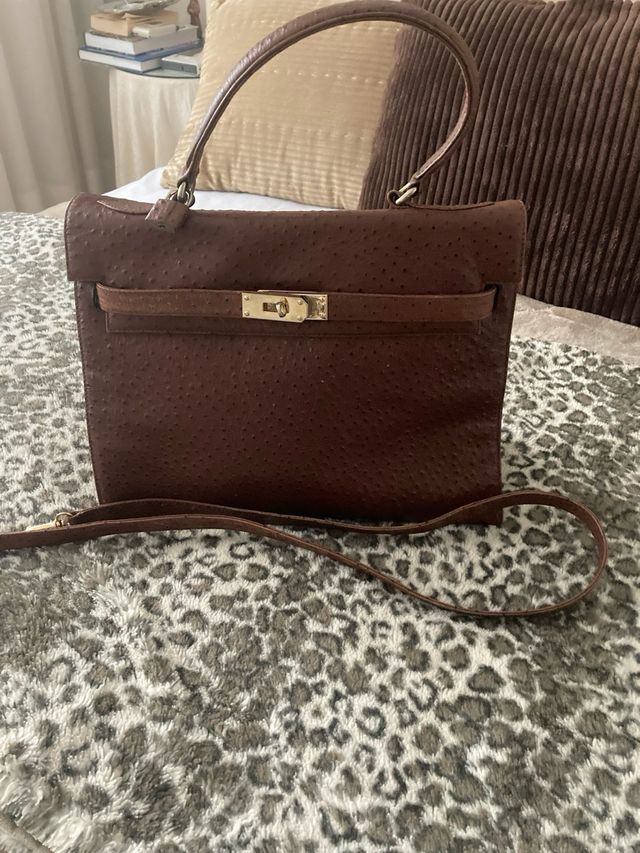 Bolso de piel marrón impecable