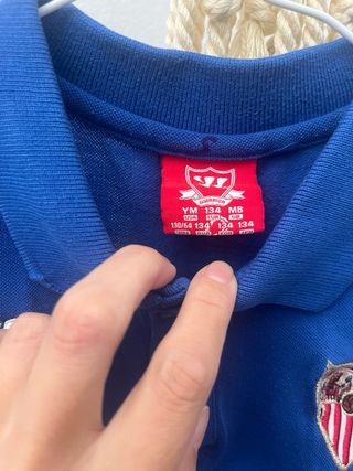 Polo azul niño Warrior Sevilla FC talla 9 años