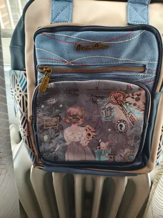Mochila con diseño de perrito y flores