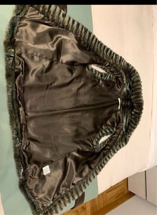 Chaleco pelo sintético con cinturón