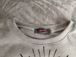 Sudadera gris Iluminati