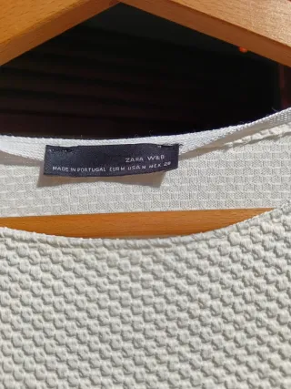 Blusa blanca texturizada manga acampanada