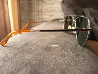 Gafas de sol Hawkers doradas y verdes