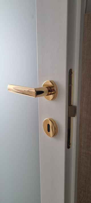 Maniglie porta dorate