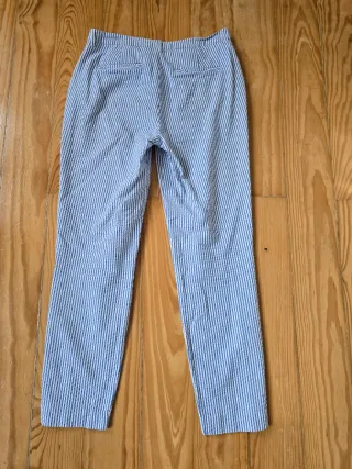 Calças Springfield riscas azuis e brancas