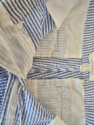 Calças Springfield riscas azuis e brancas