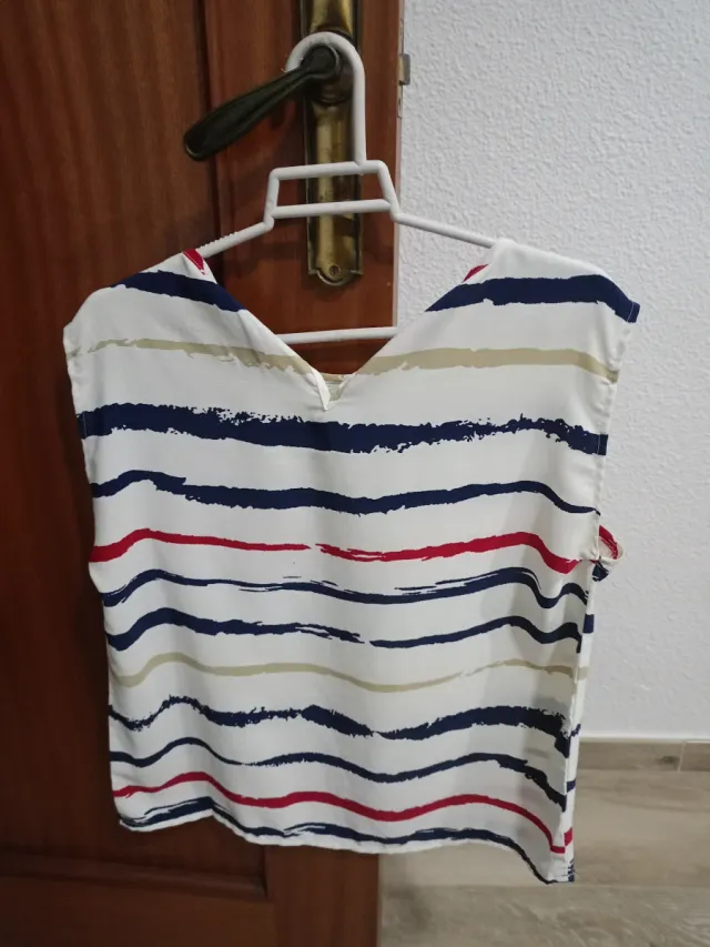 Blusa de mujer con rayas multicolor Cada una a 3