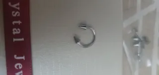 Piercing para ombligo plateado