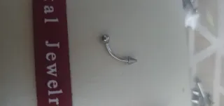 Piercing para ombligo plateado