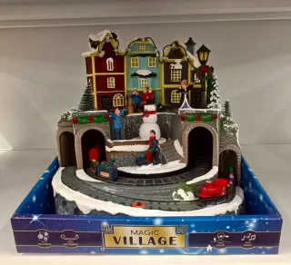 Scena Natalizia Magica con Treno, Luci e Musica