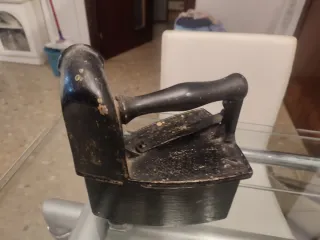 Plancha antigua de hierro