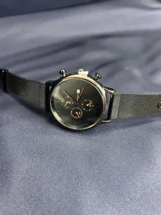 Orologio con cinturino in maglia metallica