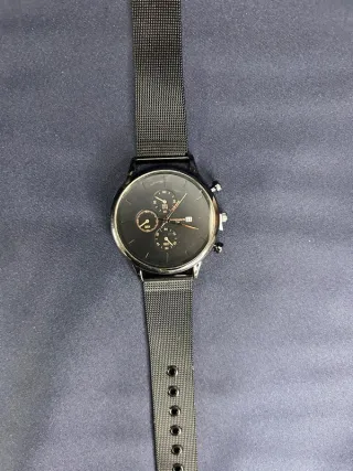 Orologio con cinturino in maglia metallica