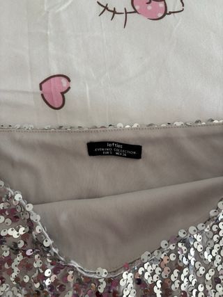 Top lentejuelas plateadas Talla S