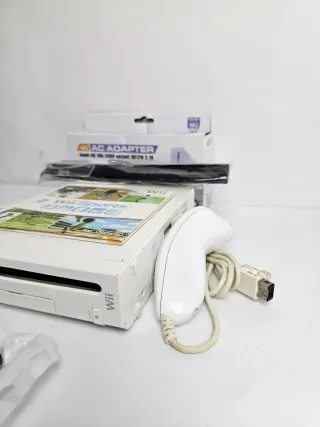 Nintendo Wii + Controller + Nunchuk + Wii Sports