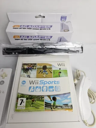 Nintendo Wii + Controller + Nunchuk + Wii Sports