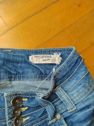 Jeans vita bassa con elastico alla caviglia