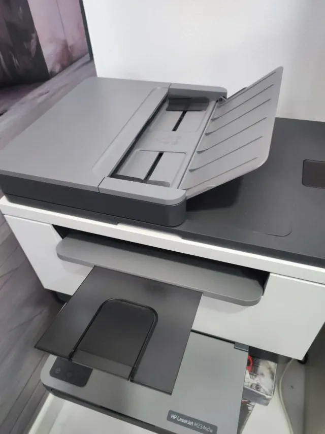 Impresora HP Multifunción Gris y Blanca