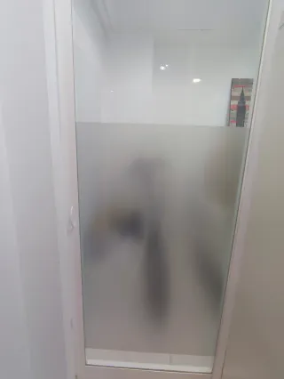 Puerta corredera de cristal