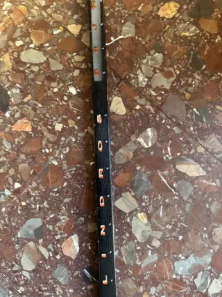 Palo de hockey negro