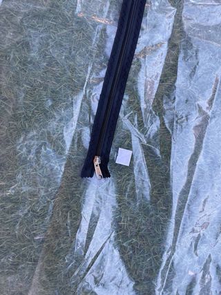 Puerta con cremallera para protección contra polvo