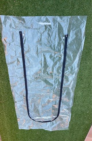 Puerta con cremallera para protección contra polvo