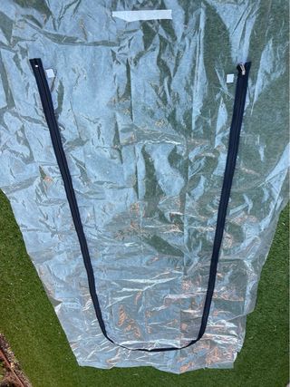 Puerta con cremallera para protección contra polvo