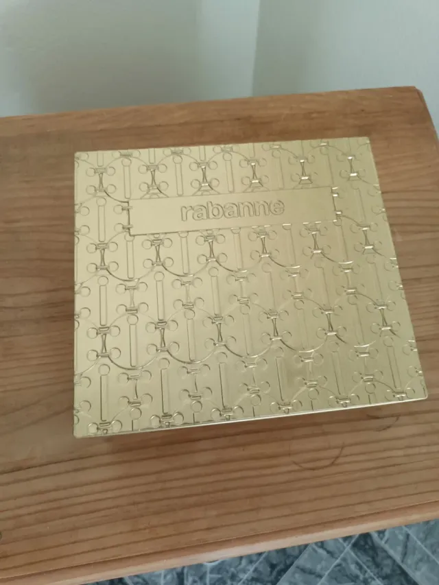 Lata metallica dorata Paco Rabanne