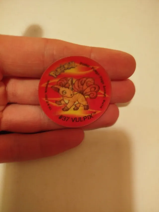 Tazzi Pokémon olografiche e tappi olografici